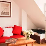 Apartment With Balcony Under The Roofs Of Paris